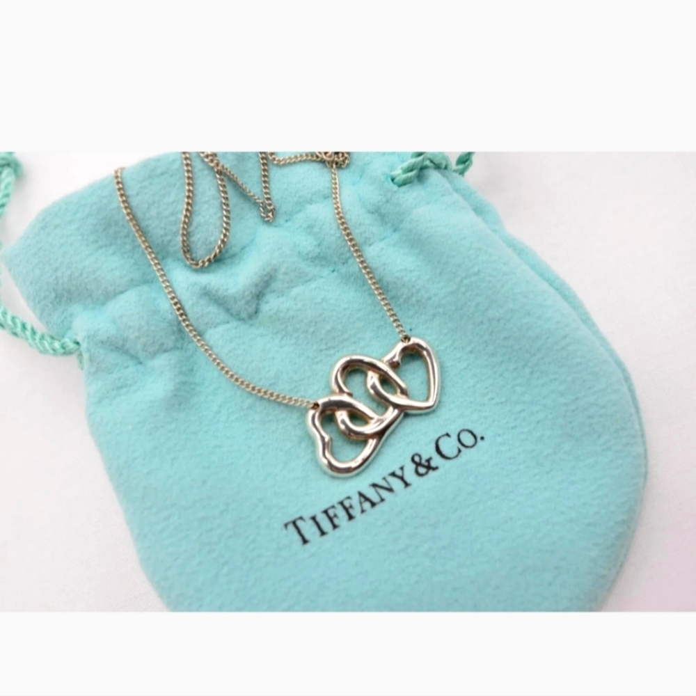 Beautiful Tiffany and CO necklace 3hearts